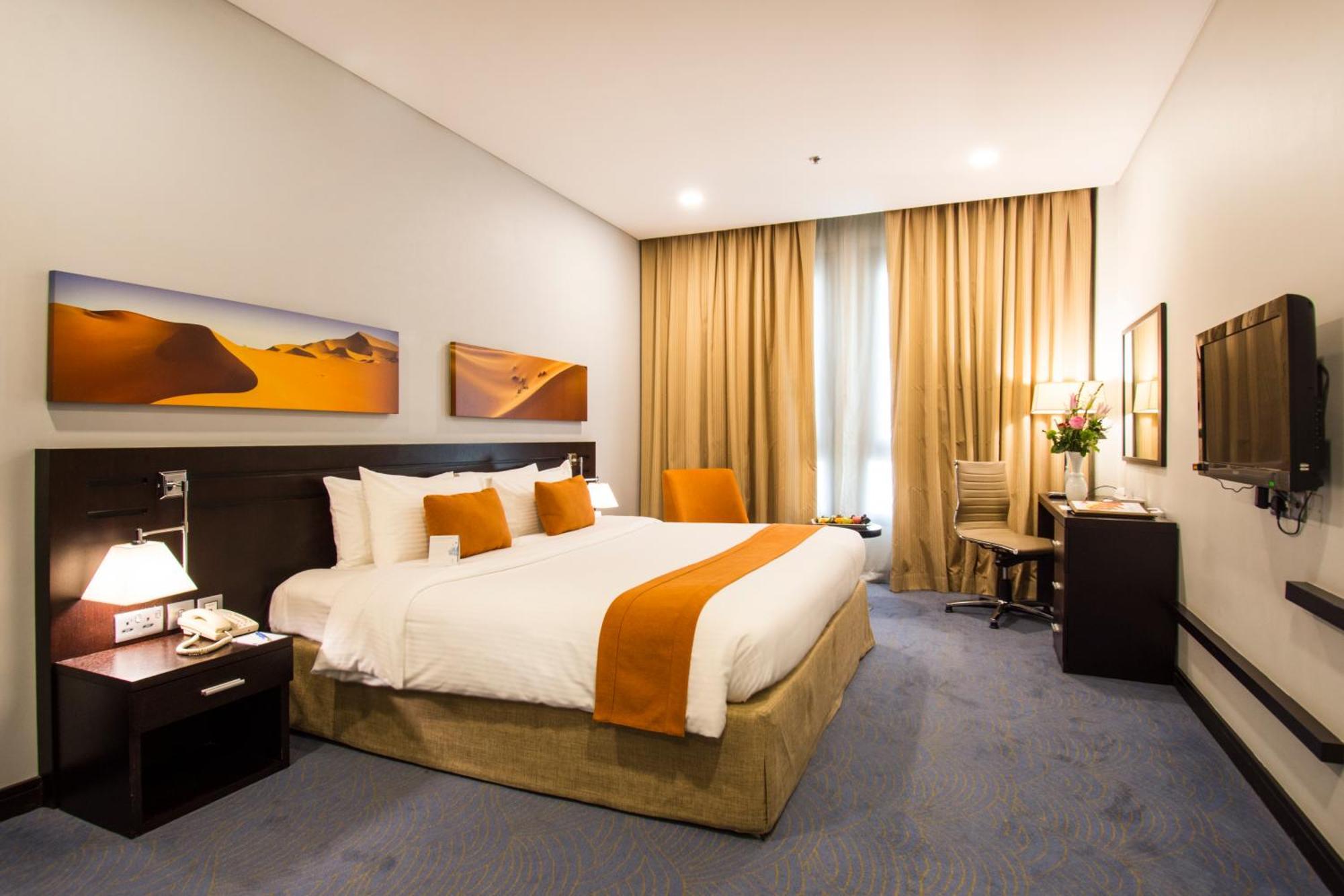 City Seasons Hotel & Suites Maskat Pokoj fotografie