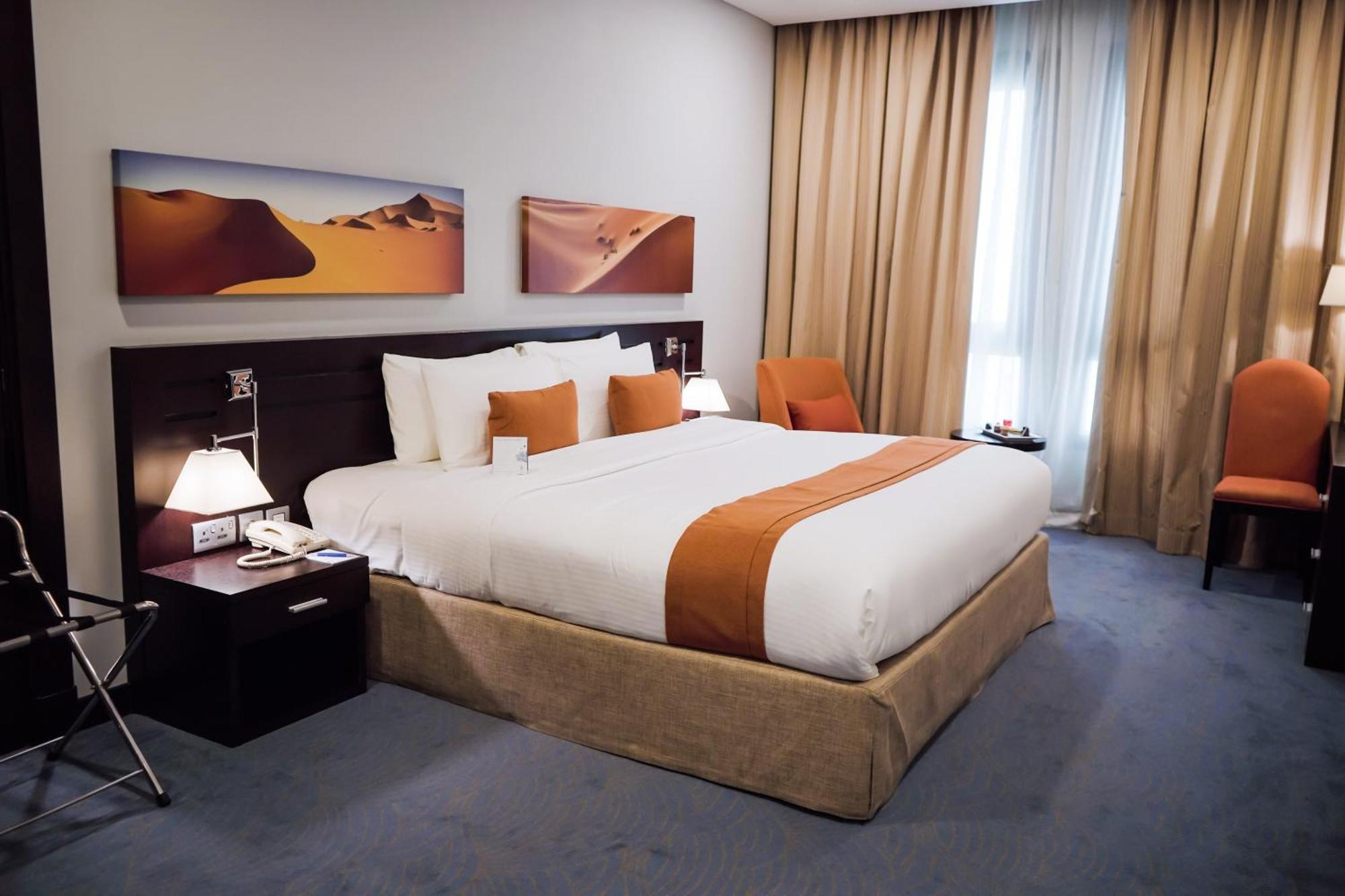 City Seasons Hotel & Suites Maskat Pokoj fotografie