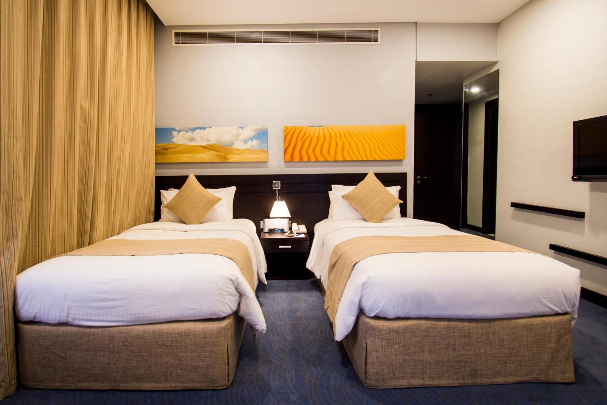 City Seasons Hotel & Suites Maskat Pokoj fotografie