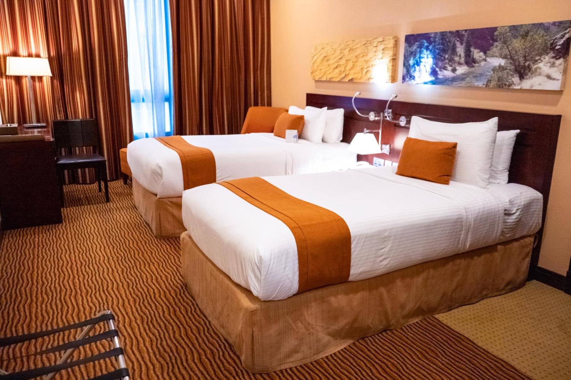 City Seasons Hotel & Suites Maskat Pokoj fotografie