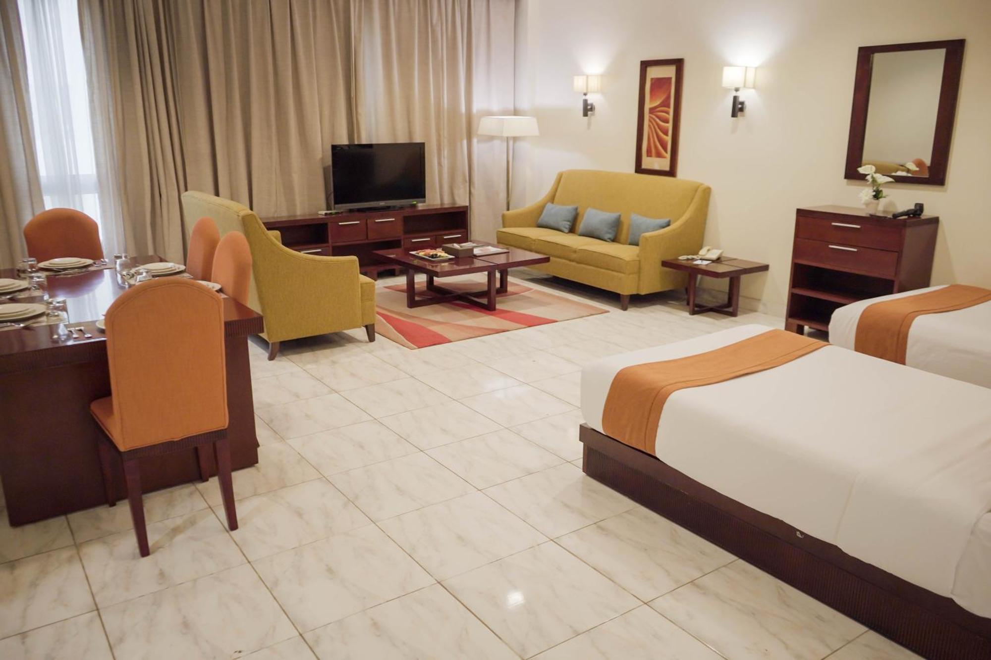 City Seasons Hotel & Suites Maskat Pokoj fotografie